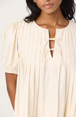 Pleated swing top